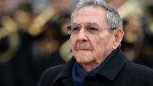 Cuba&#39;s president Raul Castro observes a welcoming ceremony at the Arc de Triomphe in Paris in 2016.