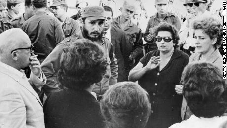 Cuban prime minister Fidel Castro talking with parents of some of the American prisoners held hostage for food and supplies by the Cuban government after the abortive emigre invasion at the Bay of Pigs, January 1963.