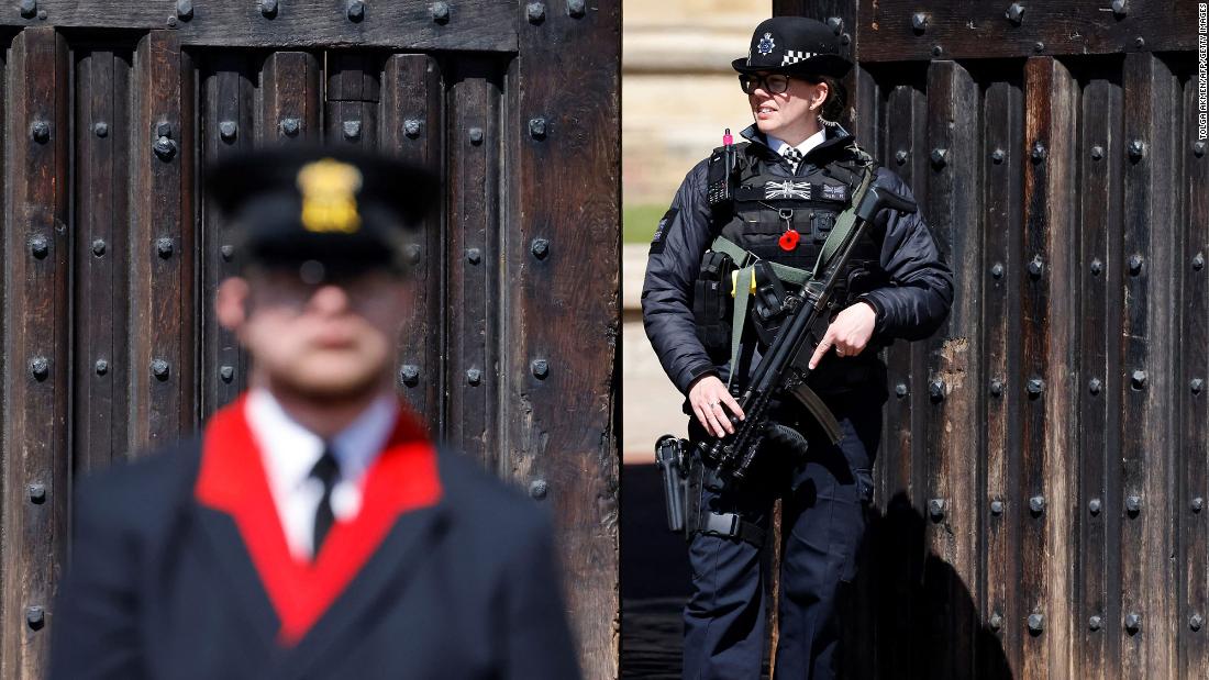 A police officer stands guard at Windsor Castle before the funeral.