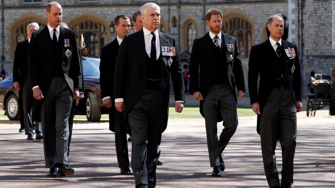 Members of the royal family walk behind Philip&#39;s coffin during the procession to St. George&#39;s Chapel. In the first row here are Philip&#39;s sons Prince Andrew, left, and Prince Edward. Behind them are Philip&#39;s grandsons Prince William, Peter Phillips and Prince Harry.