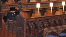 Britain&#39;s Queen Elizabeth II takes her seat at the funeral of her husband, Prince Philip, on Saturday, April 17.