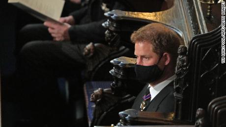 Britain&#39;s Prince Harry, Duke of Sussex attends the funeral service of Britain&#39;s Prince Philip. He sat alone during the service.