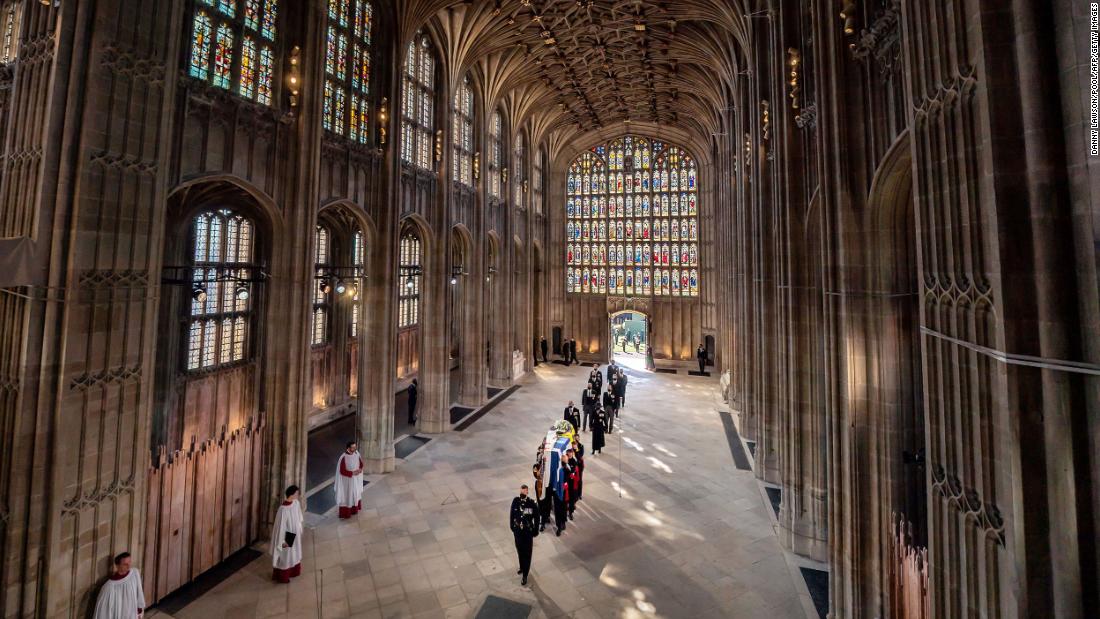 Pallbearers are followed by members of the royal family inside St. George&#39;s Chapel.