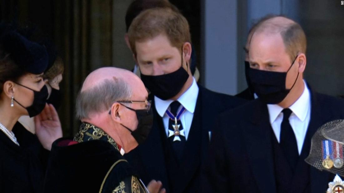 Princes William and Harry walk together after grandfather's funeral