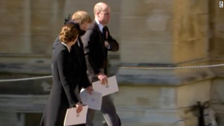 Prince William walks with his brother Prince Harry (center) and wife Catherine, Duchess of Cambridge, after Prince Philip&#39;s funeral.