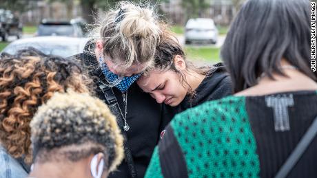 Mourners attend a prayer vigil at Olivet Missionary Baptist Church April 17, 2021 in Indianapolis, Indiana. The vigil was held in the wake of a mass shooting April 15 at a FedEx Ground Facility that left at least eight people dead and seven wounded