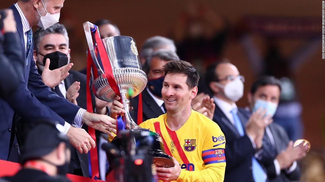 Is this goodbye? Barcelona teammates line up for photos with Lionel Messi following Copa del Rey victory