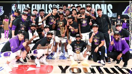 The Los Angeles Lakers pose for a team photo after Game Six of the NBA Finals on October 11, 2020, in Orlando, Florida.