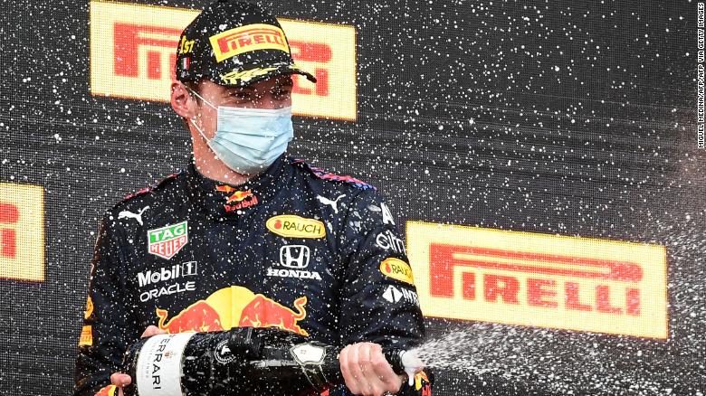 Max Verstappen celebrates after winning the Imola Grand Prix.