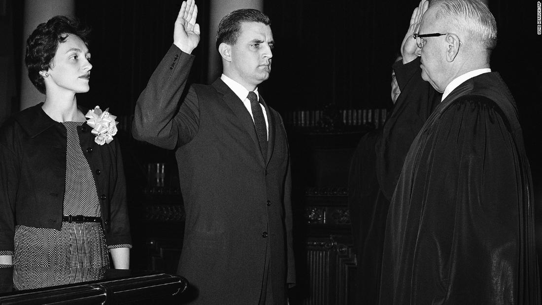 Mondale is sworn in as Minnesota Attorney General by Minnesota Supreme Court Chief Justice Roger Dell, right, on May 5, 1960, in St. Paul, Minnesota.