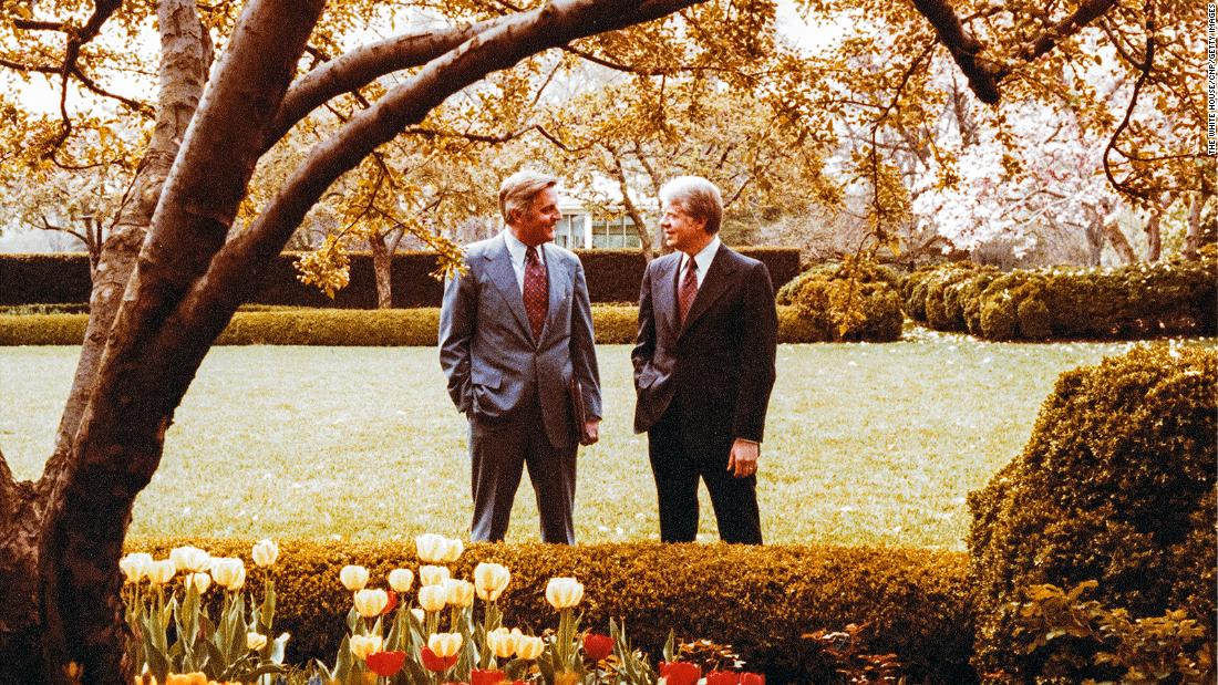 Mondale and President Carter talk together in the Rose Garden of the White House on April 13, 1978, in Washington, DC.