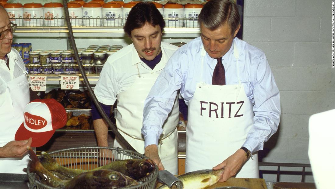 Mondale scales a fish during a campaign stop in Pittsburgh in April 1984. His nickname, &quot;Fritz,&quot; is printed on his apron.