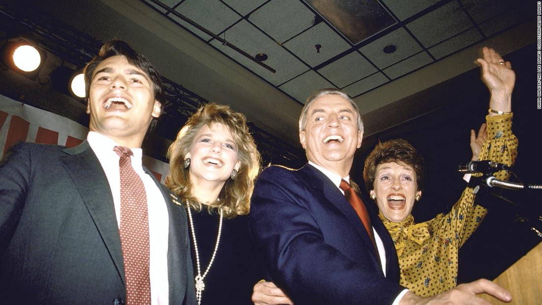 Mondale and family William, Eleanor, and wife Joan celebrate at a party following the debate.