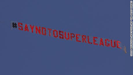 A plane flies over Elland Road in protest against the European Super League.