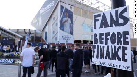 A fan sign is seen reading &quot;Fans before finance, All fans aren&#39;t we&quot; as a protest against the European Super League outside Elland Road prior to the match between Leeds United and Liverpool on April 19.