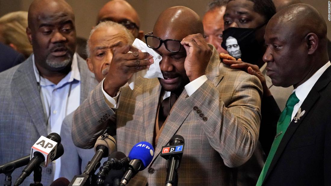 George Floyd&#39;s brother, Philonise Floyd, wipes his eyes during a post-verdict news conference in Minneapolis on April 20.