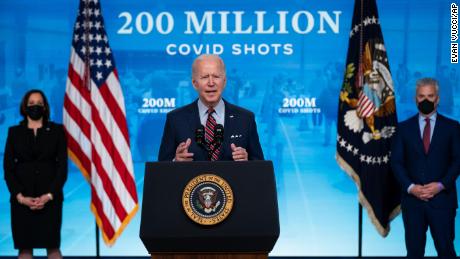Vice President Kamala Harris, left, and White House COVID-19 Response Coordinator Jeff Zients, right, listen as President Joe Biden speaks about COVID-19 vaccinations at the White House, Wednesday, April 21, 2021, in Washington. 