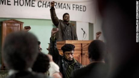 FBI informant William O&#39;Neal (LaKeith Stanfield) stands in the foreground, as Fred Hampton Sr. (Daniel Kaluuya) delivers a speech in the Oscar-nominated &quot;Judas and the Black Messiah.&quot;
