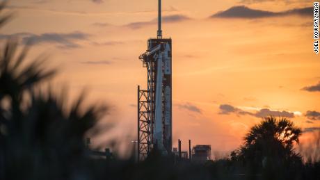 A SpaceX Falcon 9 rocket with the company&#39;s Crew Dragon spacecraft onboard is seen on the launch pad at Launch Complex 39A as preparations continue for the Crew-2 mission, Tuesday, April 20, 2021, at NASA&#39;s Kennedy Space Center in Florida. 