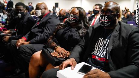 Member of George Floyd&#39;s family, from right, Philonise Floyd, Keeta Floyd, Rodney Floyd and Brandon Williams, attend the funeral services of Daunte Wright.