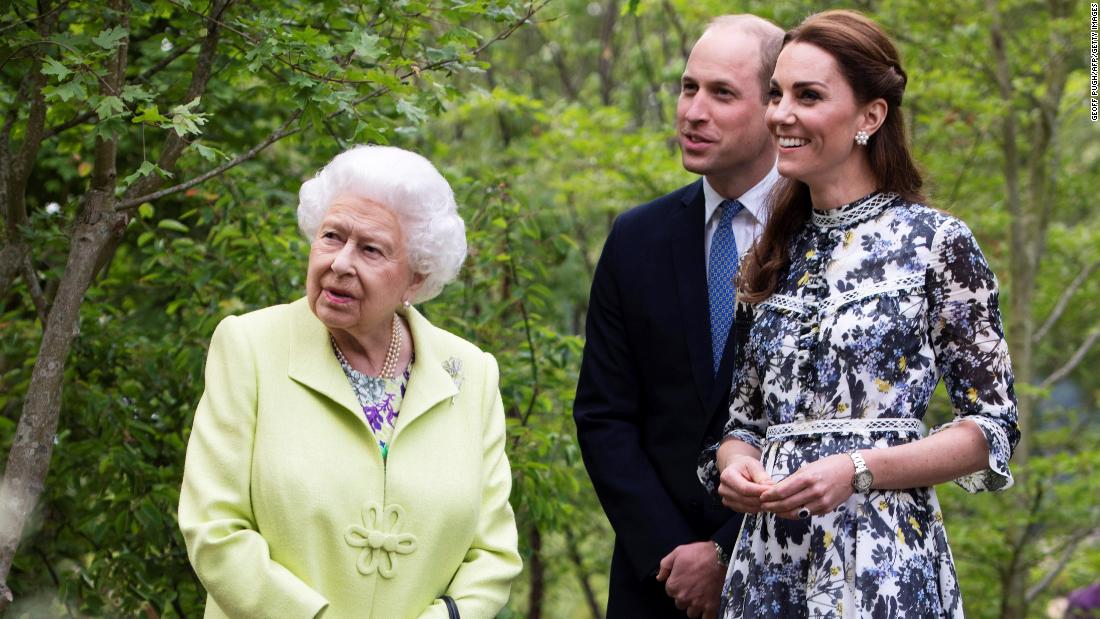 Catherine shows William and Queen Elizabeth II around the &quot;Back to Nature Garden&quot; that she helped designed as they visit the Chelsea Flower Show in London in May 2019.
