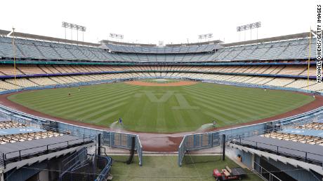 Dodger Stadium, home to the Los Angeles Dodgers, will open two sections of seats to fully vaccinated fans, where social distancing isn&#39;t required but wearing a mask is. 