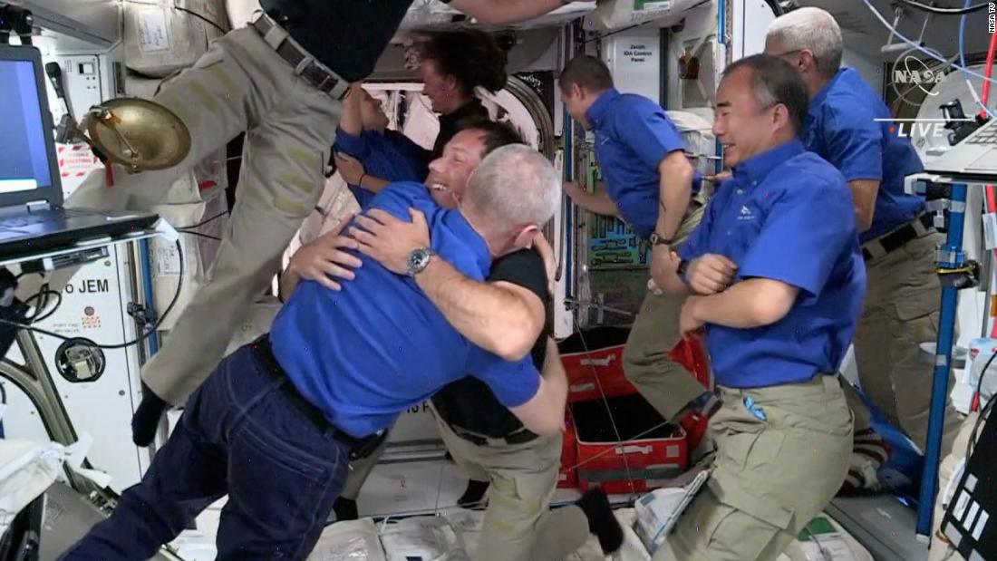 Astronauts welcome new crew aboard the ISS
