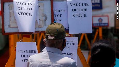 Notices about the shortage of Covid-19 vaccines on the gate of a vaccination centre in Mumbai, India, on April 20.
