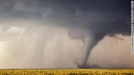 A  tornado cuts its way through a field in Minneola, Kansas, on May 24, 2016.