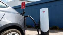 A Tesla car charges at a Tesla Supercharger station on April 26, 2021 in Corte Madera, California. Tesla will report first quarter earnings today after the closing bell. (Photo by Justin Sullivan/Getty Images)