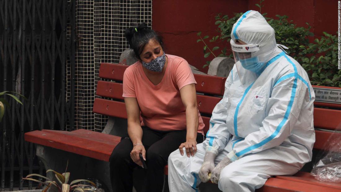 A relative of a Covid-19 victim breaks down during a cremation in New Delhi on April 20.