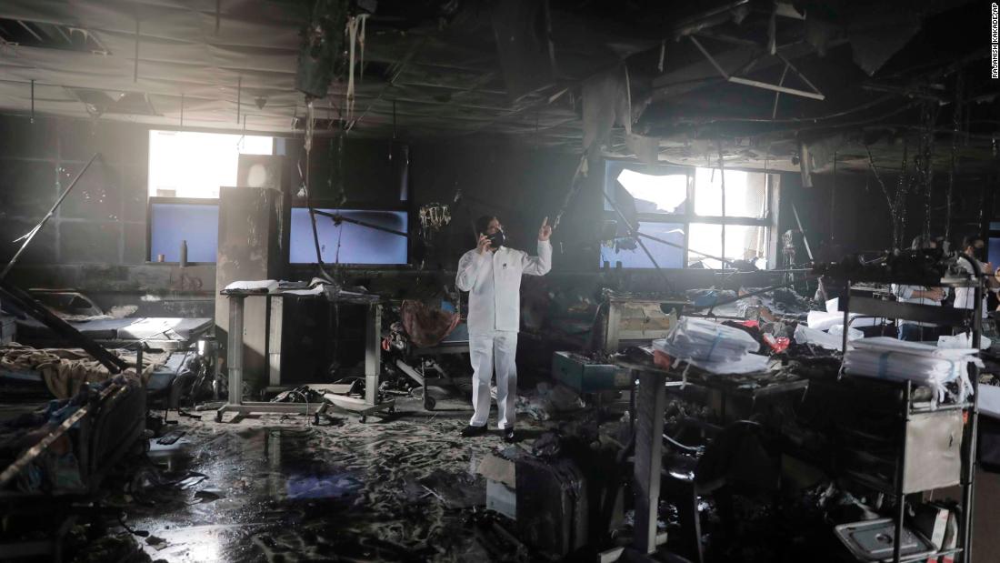A man inspects an intensive-care ward after a fire broke out at a Covid-19 hospital in Virar on April 23. At least 13 Covid-19 patients were killed in the fire.