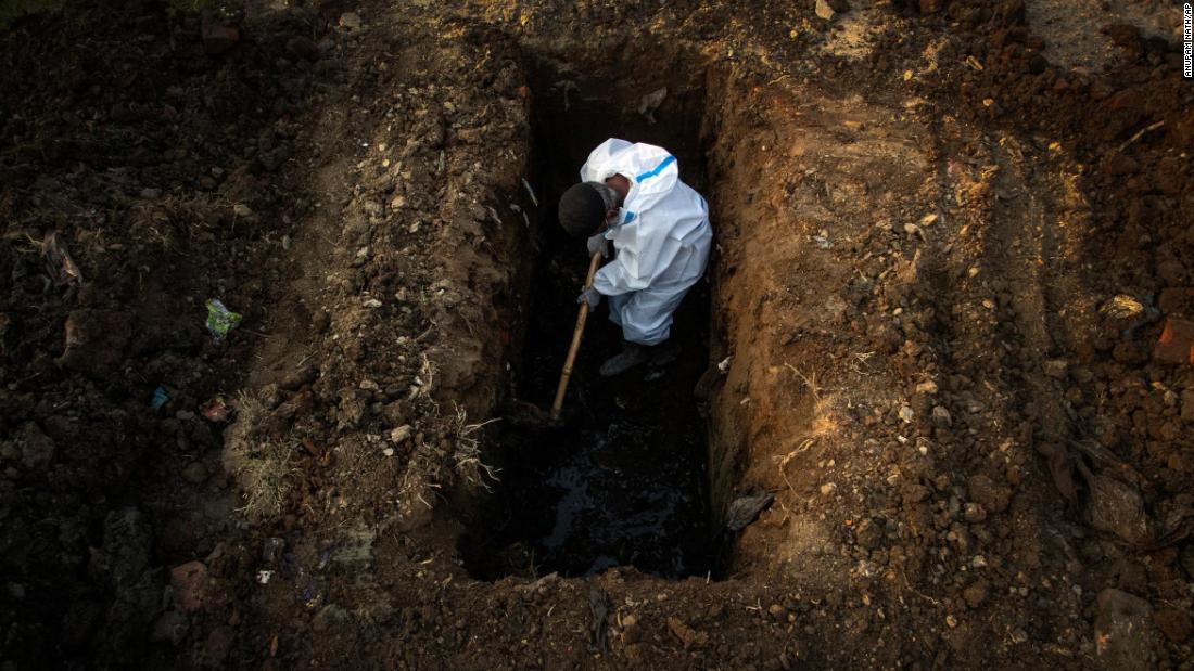 A worker digs a grave for a Covid-19 victim in Guwahati on April 25. 
