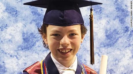 Mike Wimmer, 12, will graduate college on May 21, and high school on May 28.