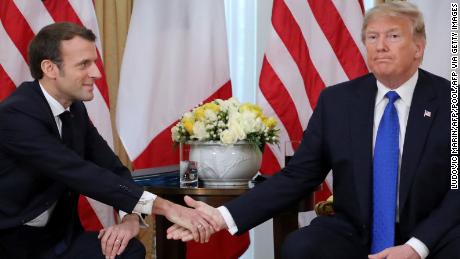 Former US President Donald Trump, right,  and French President Emmanuel Macron in London on December 3, 2019, for a meeting of leaders from the transatlantic security and political alliance NATO.