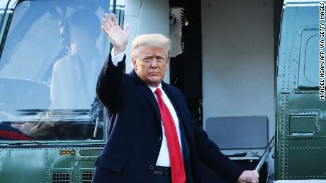 Outgoing US President Donald Trump waves as he boards Marine One at the White House in Washington, DC, on January 20, 2021. - President Trump travels his Mar-a-Lago golf club residence in Palm Beach, Florida, and will not attend the inauguration for President-elect Joe Biden. (Photo by MANDEL NGAN / AFP) (Photo by MANDEL NGAN/AFP via Getty Images)