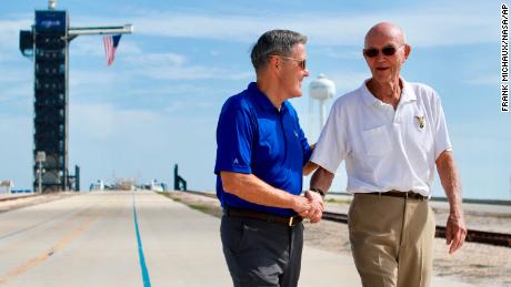Collins, right, speaks to Kennedy Space Center Director Bob Cabana at Launch Complex 39A, about the moments leading up to Apollo 11 launch 50 years later on July 16, 2019.