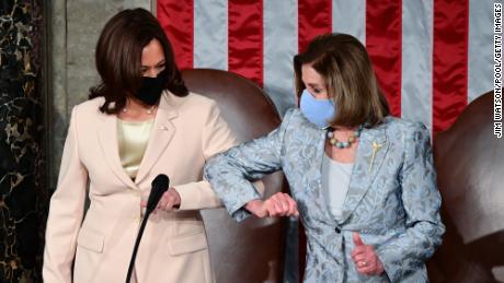 WASHINGTON, DC - APRIL 28: U.S. Vice President Kamala Harris (L) greets Speaker of the United States House of Representatives Nancy Pelosi (D-CA) ahead of U.S. President Joe Biden addressing a joint session of Congress in the House chamber of the U.S. Capitol April 28, 2021 in Washington, DC. On the eve of his 100th day in office, Biden will speak about his plan to revive America&#39;s economy and health as it continues to recover from a devastating pandemic. He will deliver his speech before 200 invited lawmakers and other government officials instead of the normal 1600 guests because of the ongoing COVID-19 pandemic. (Photo by Jim Watson - Pool/Getty Images)