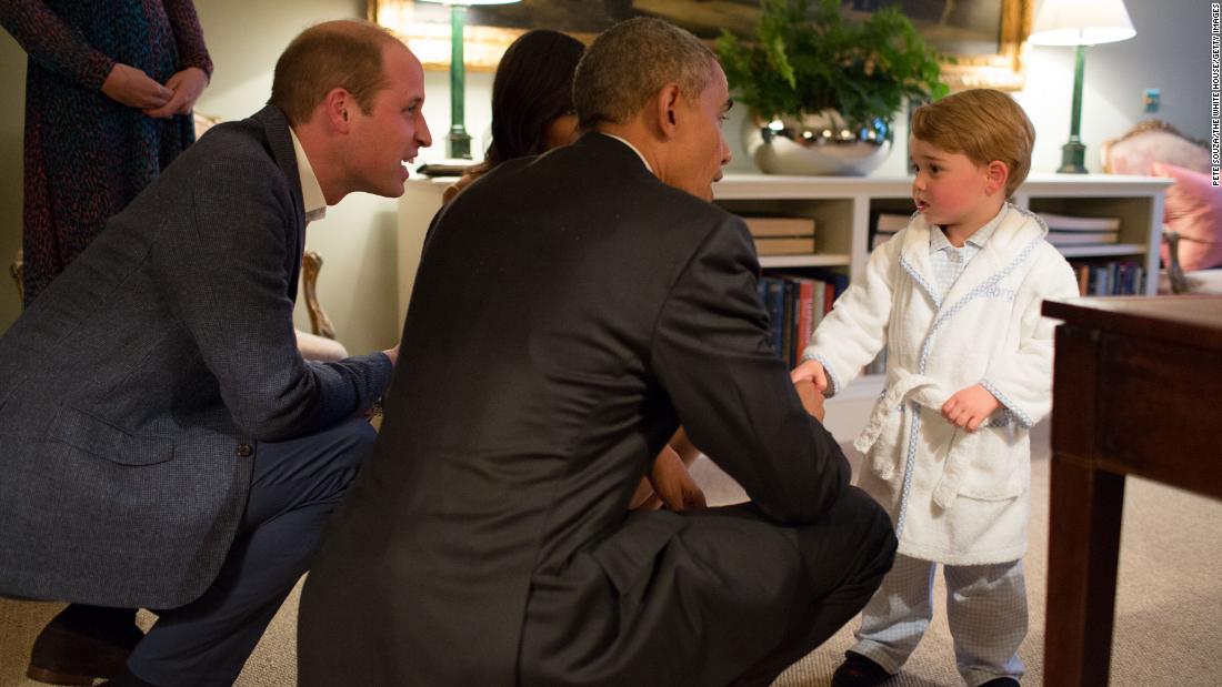 US President Barack Obama talks to Prince George while visiting Kensington Palace in 2016.