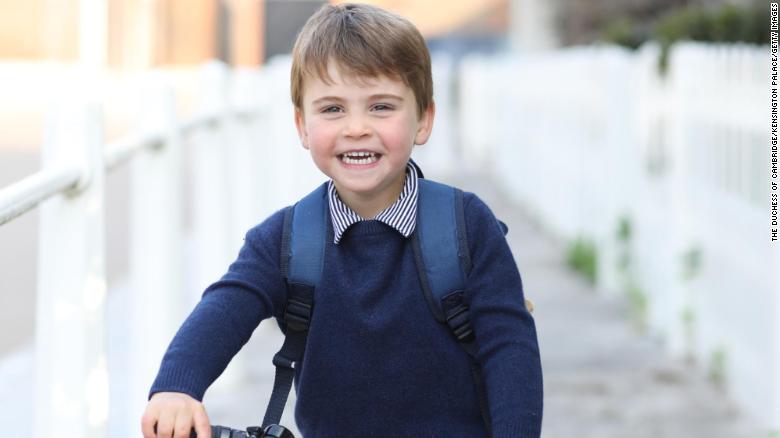 Prince Louis, William and Kate&#39;s youngest son, rides his bicycle before leaving for his first day of nursery school in April 2021. Louis is fifth in line to the throne.