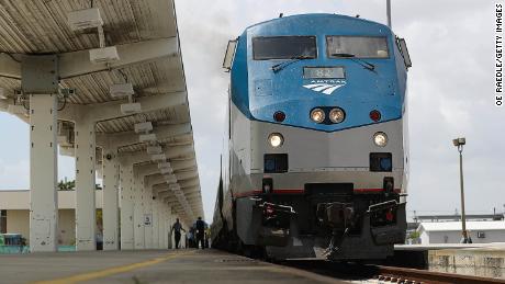 MIAMI, FL - MAY 24: An Amtrak train is seen as people board at the Miami station on May 24, 2017 in Miami, Florida. President Donald Trump&#39;s budget proposal would terminate federal dollars that support Amtrak&#39;s long-distance services, which would potentially mean an elimination of all Amtrak service in Florida. (Photo by Joe Raedle/Getty Images)