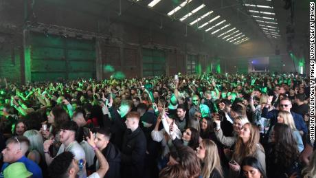 Partygoers dance in Liverpool on April 30 as part of a UK experience.