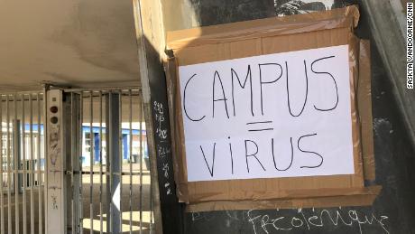 A handwritten placard reading &quot;Campus = Virus&quot; at the Eugene Delacroix high school in Seine-Saint-Denis, a suburb northeast of Paris, where at least 20 pupils have lost a relative to Covid-19.