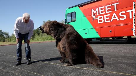 Republican California gubernatorial candidate John Cox greets a 1,000 pound bear at the start of a campaign rally at Miller Regional Park on May 04, 2021 in Sacramento, California.