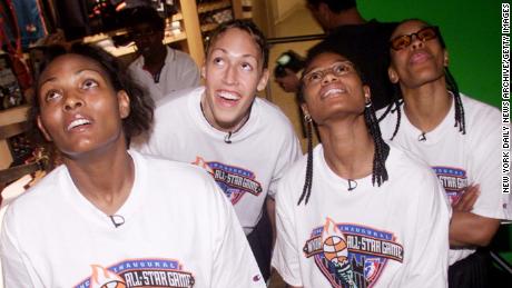 WNBA All-Stars (l. to r.) Kym Hampton; Rebecca Lobo; Vickie Johnson and Theresa Weatherspoon, of the New York Liberty, look at video at the NBA Store on Fifth Ave., where they met fans.  