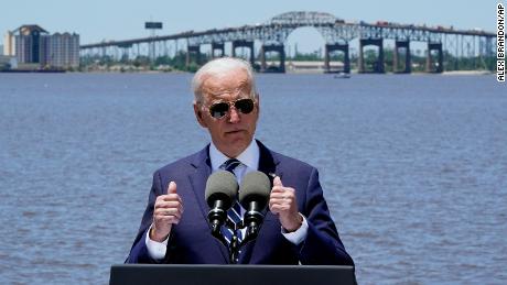 President Joe Biden speaks with the Interstate 10 Calcasieu River Bridge behind him, Thursday, May 6, 2021, in Lake Charles, La. (AP Photo/Alex Brandon)