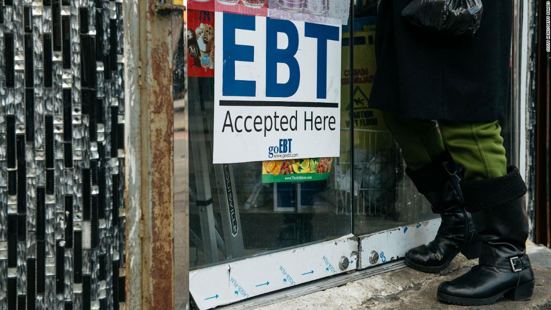 A sign alerting customers about food stamps is displayed at a Brooklyn grocery store on December 5, 2019 in New York City. 