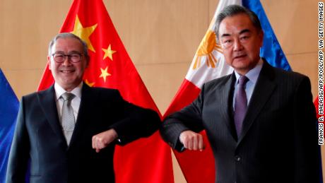 Philippine Foreign Affairs secretary Teodoro Locsin and Chinese Foreign Minister Wang Yi attend a meeting in Manila on January 16, 2021.