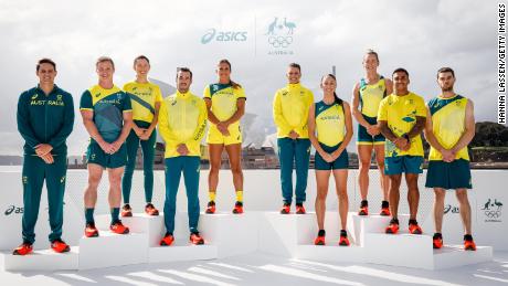 Australian Olympic athletes, including Maurice Longbottom, second from right, pose during the team&#39;s uniform unveiling in Sydney on March 31.