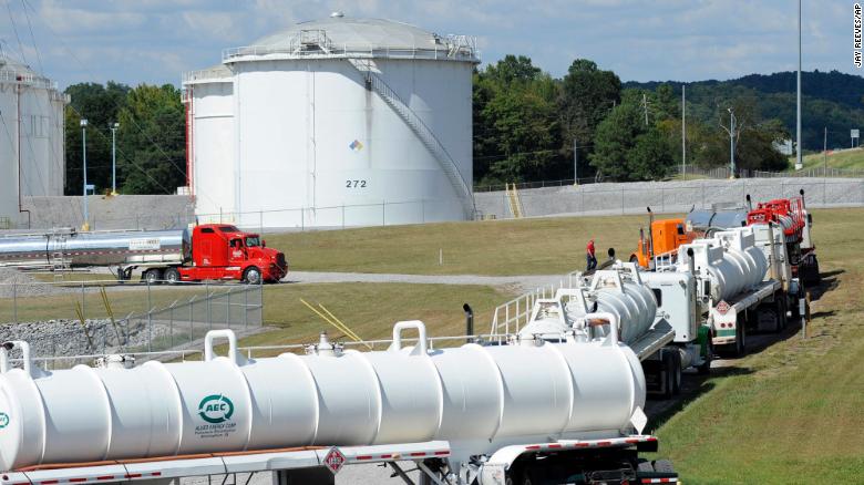 This Sept. 16, 2016, file photo shows tanker trucks lined up at a Colonial Pipeline Co. facility in Pelham, Alabama, near the scene of a 250,000-gallon gasoline spill caused by a ruptured pipeline.
